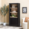 Tall black bookshelf with wooden shelves in a living room setting.